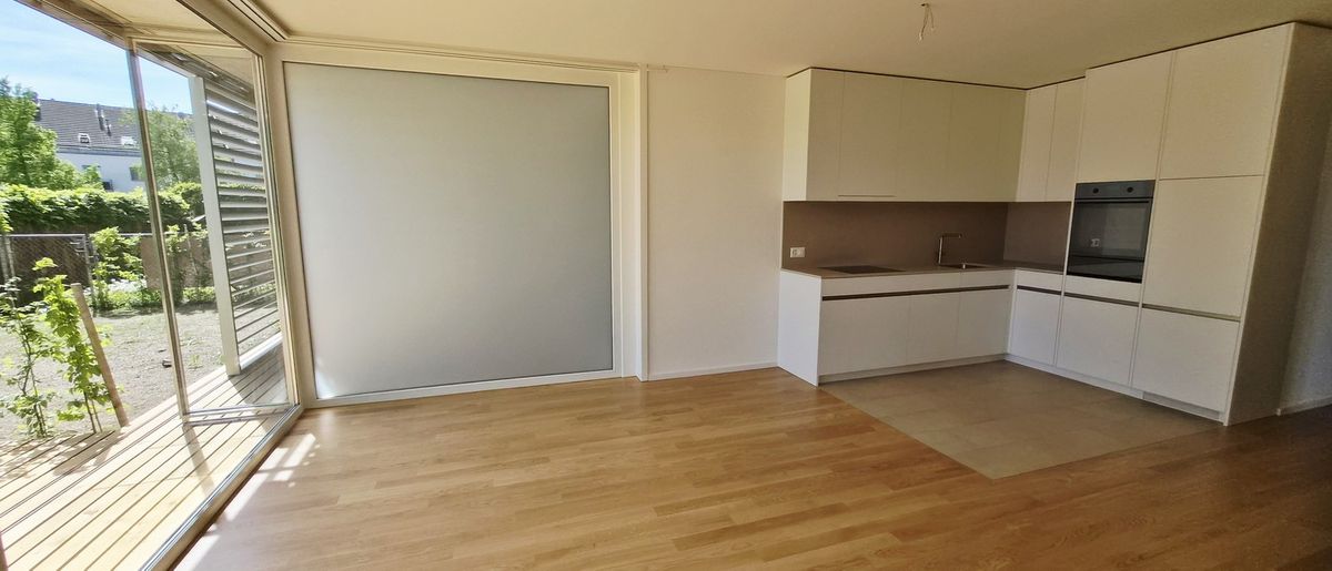 Moderne 3.5-Zimmer-Wohnung mit Mietgarten und Holzterrasse in Zürich-Schwamendingen - 1