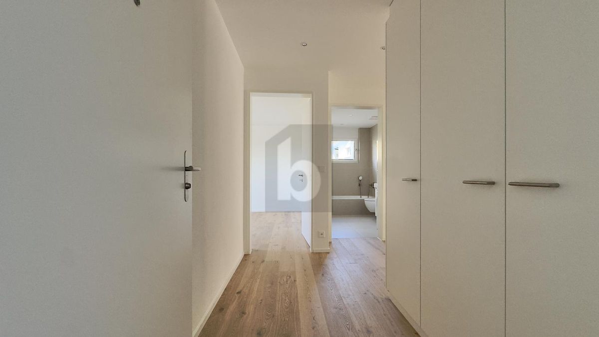 MODERNER NEUBAU AN ZENTRALER LAGE - 1