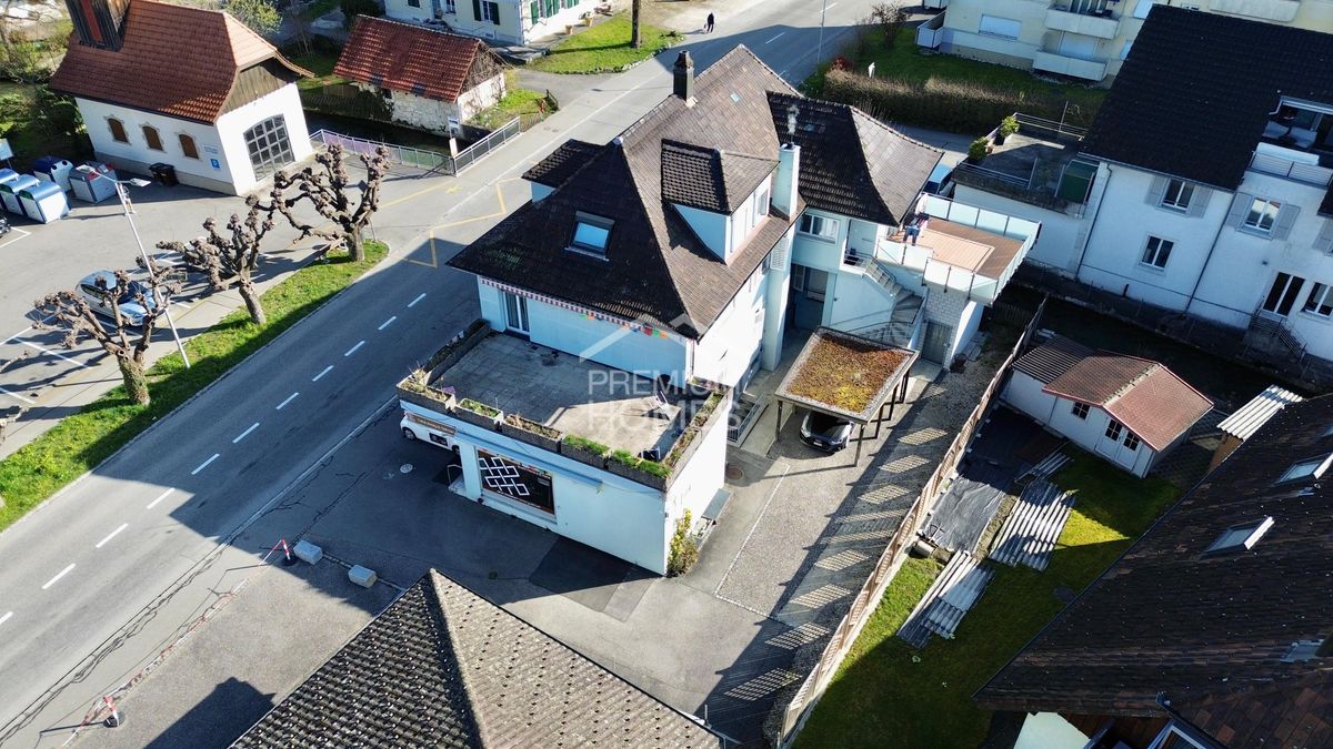 Attraktives Mehrfamilienhaus mit Gewerbeeinheit an bester Lage - 5