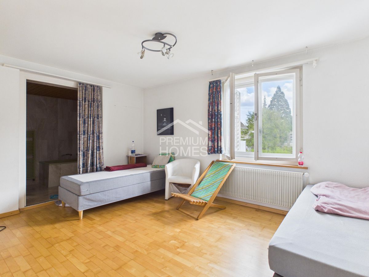 Attraktives Mehrfamilienhaus mit Gewerbeeinheit an bester Lage - 9