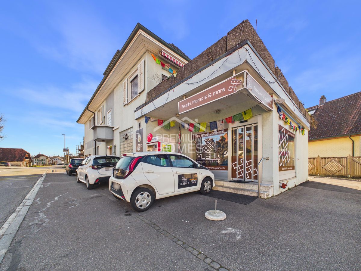 Attraktives Mehrfamilienhaus mit Gewerbeeinheit an bester Lage - 12