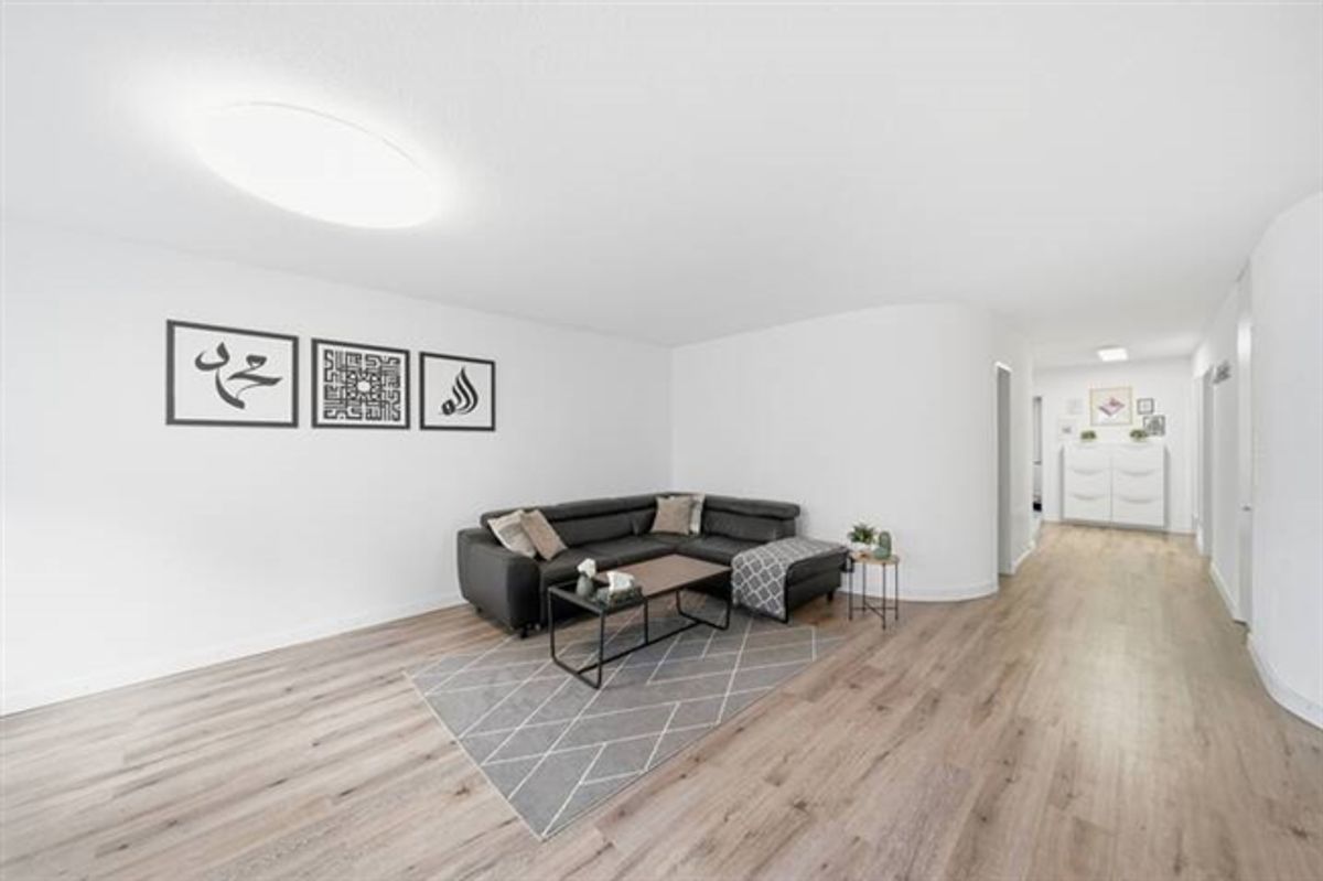 SCHMUCKE 4.5 ZIMMER GARTENWOHNUNG - 1