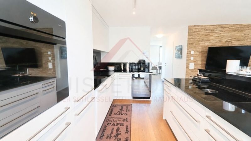 Exklusive 5.5 Zimmer Maisonette mit Designküche, Loggia und Minergie Standard - 5