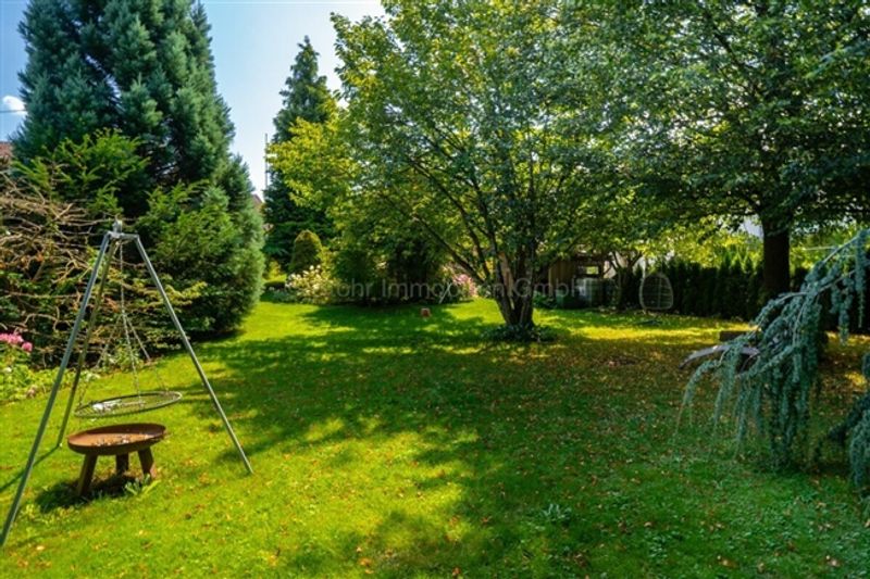 Zweifamilienhaus mit Bauland - Eine einmalige Gelegenheit - 10