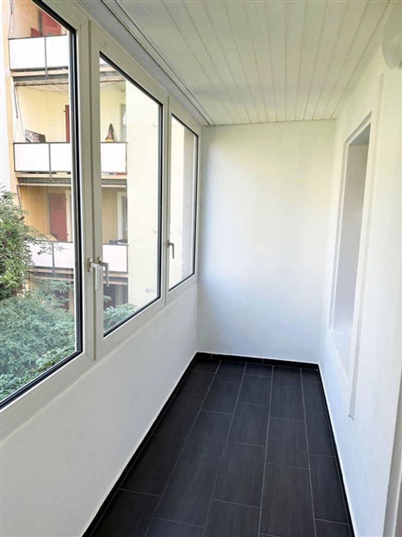Charmante, unmöblierte 2-Zimmerwohnung mit geschlossenem Balkon an der Schlossgasse 15, Basel - 10