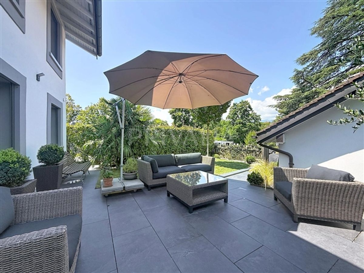 Eleganz und Komfort in einem Familienhaus mit Garten in Satigny - 3