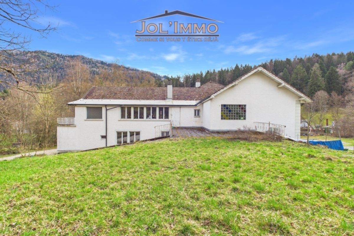Propriété de caractère avec 3 appartements et terrain à bâtir à Perrefitte - 4