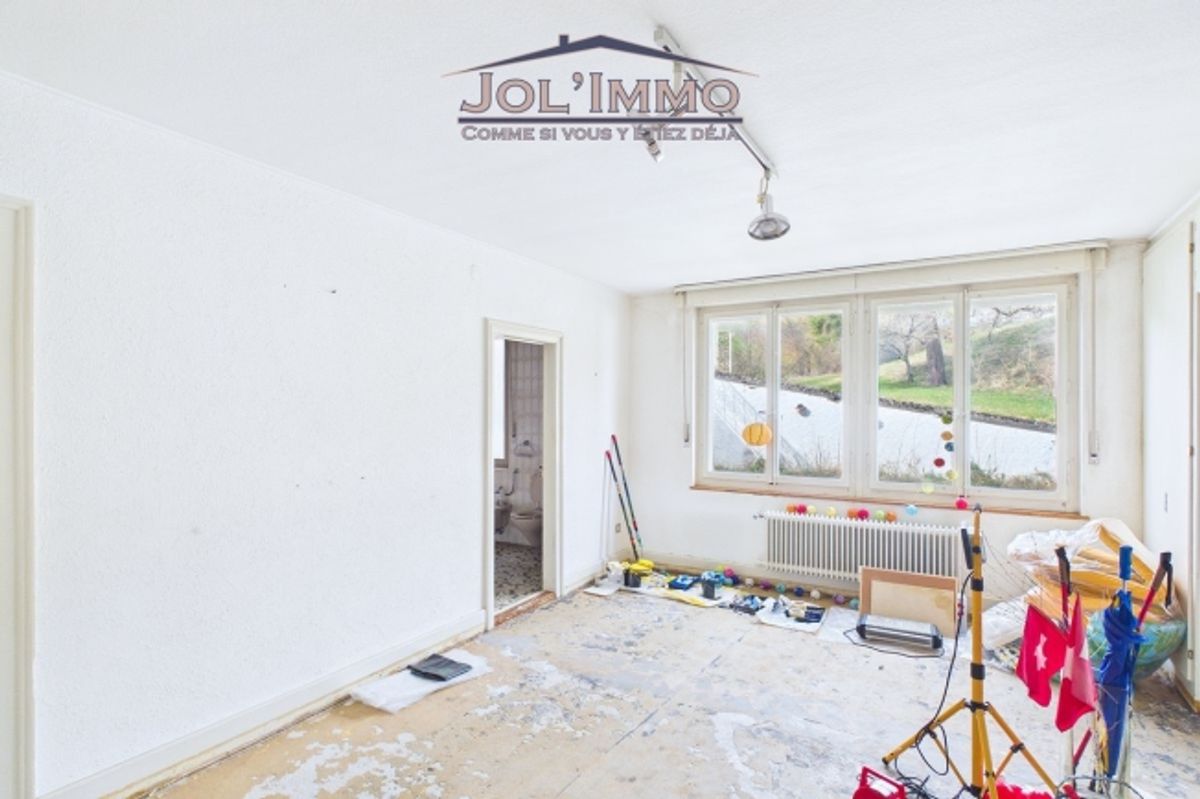 Propriété de caractère avec 3 appartements et terrain à bâtir à Perrefitte - 11