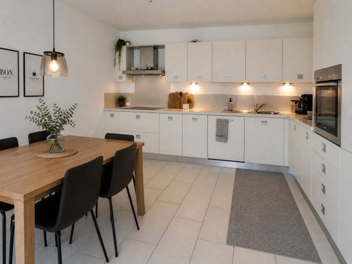 Elegante appartamento di 4.5 locali con vista panoramica e doppia terrazza ad Agno - 1