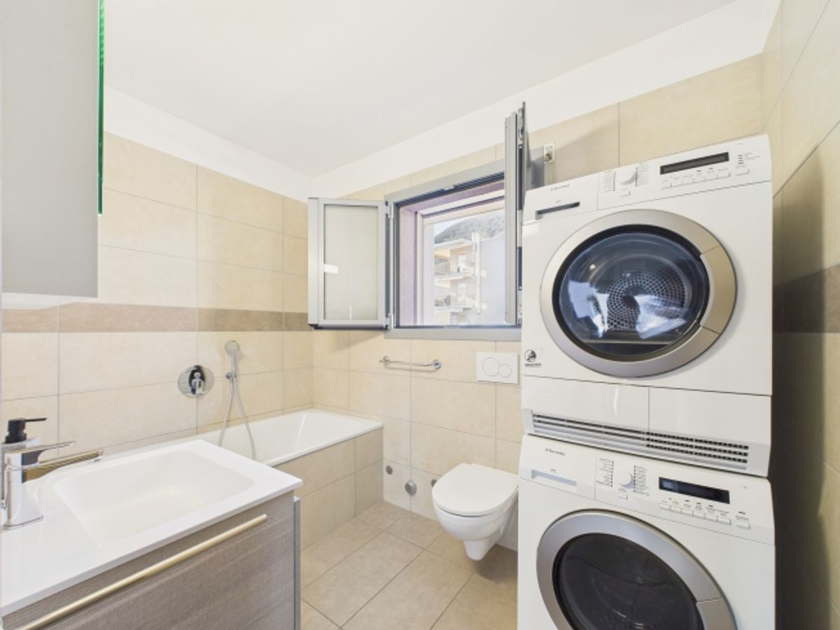 Moderno appartamento 2.5 locali con ampia terrazza a Gravesano - 6
