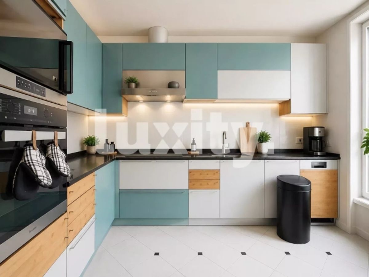 Elegante haussmannsche Wohnung mit Balkon - 2