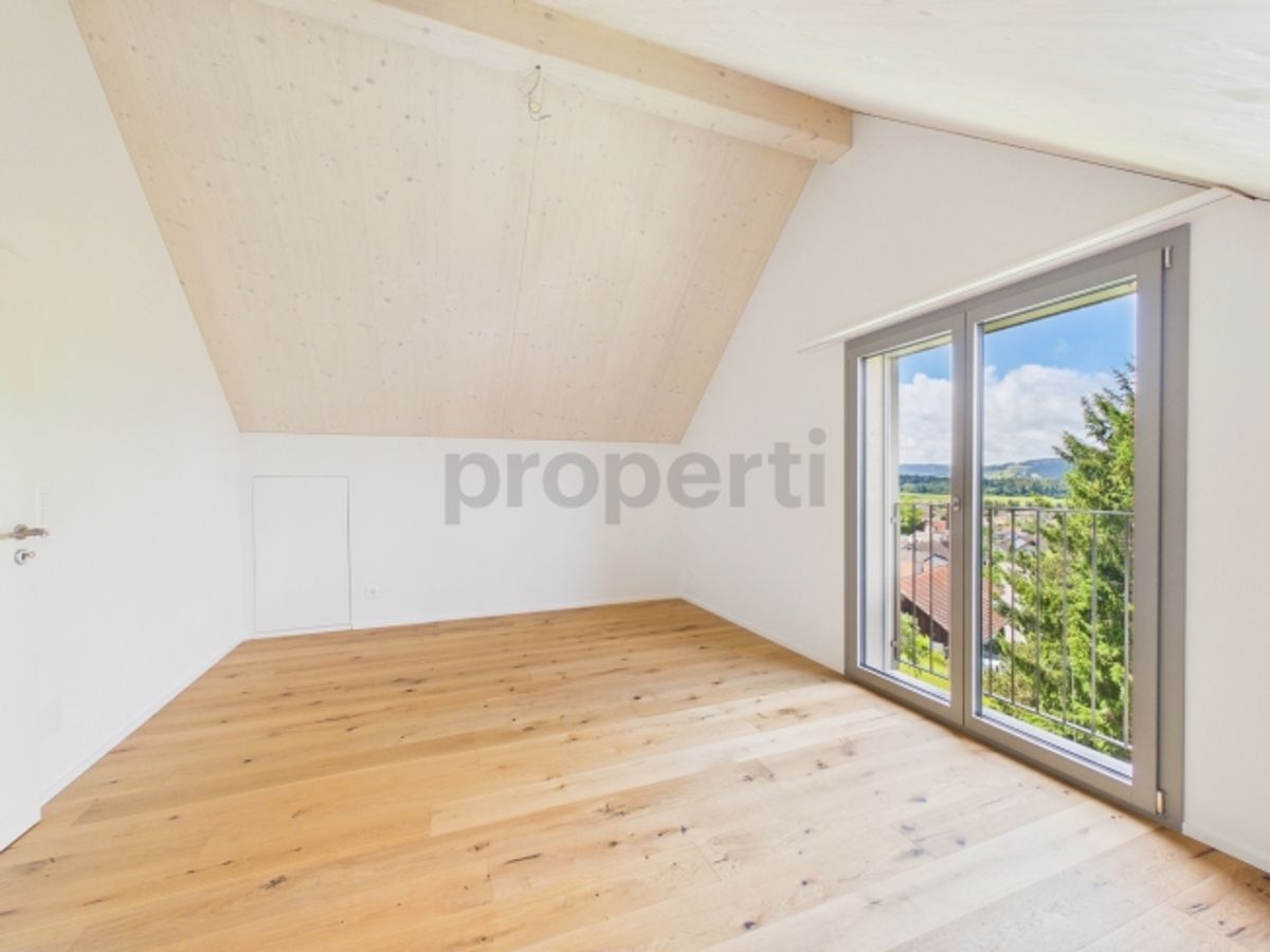 Stilvolles Neubau-Einfamilienhaus in nachhaltiger Holzbauweise mit Naturgarten und Alpenblick - 9