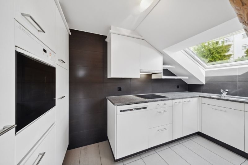 Einzigartige Dachwohnung mit Panoramasicht – charmantes Wohnen in der Stadt Luzern - 4