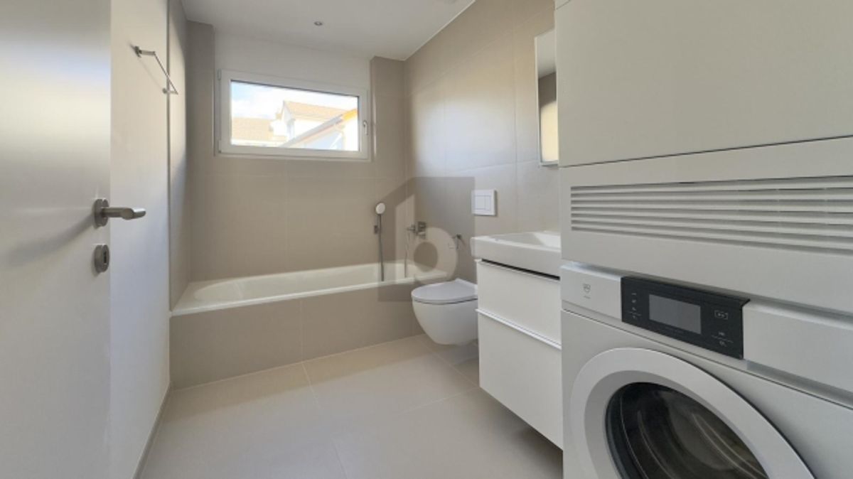 MODERNER NEUBAU AN ZENTRALER LAGE - 4