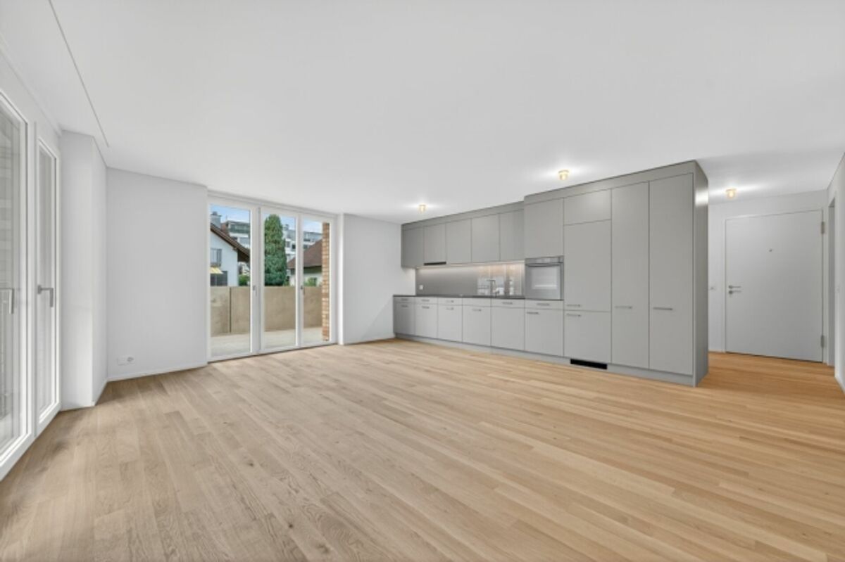 Moderne Familienwohnung mit grosszügigem Gartensitzplatz - 0
