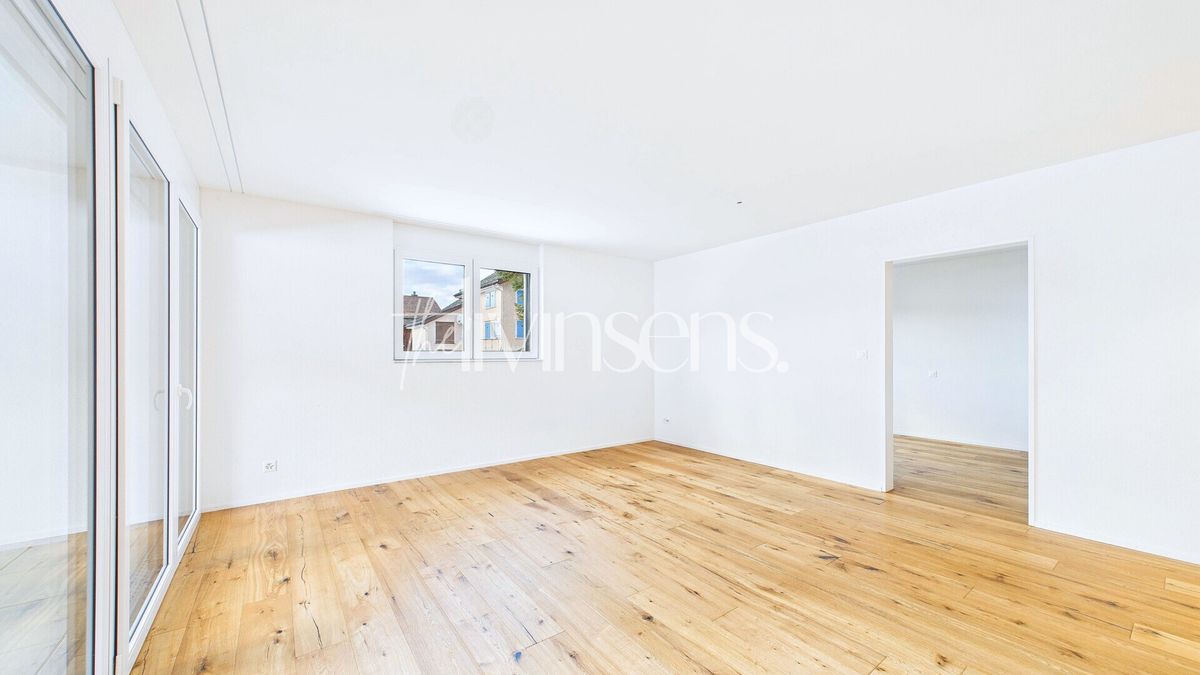 Moderne 2.5-Zimmerwohnung mit sonniger Terrasse & Bergsicht - 1