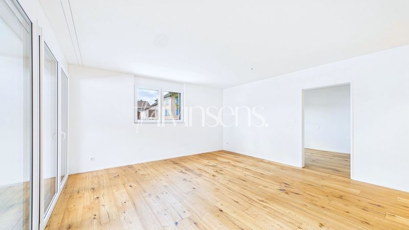 Moderne 2.5-Zimmerwohnung mit sonniger Terrasse & Bergsicht - 2