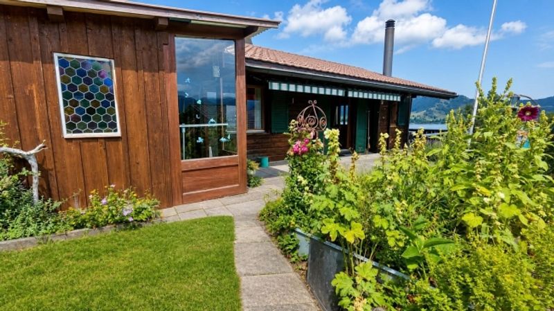 FERIENHAUS MIT SENSATIONELLER SEE- UND BERGSICHT - 5