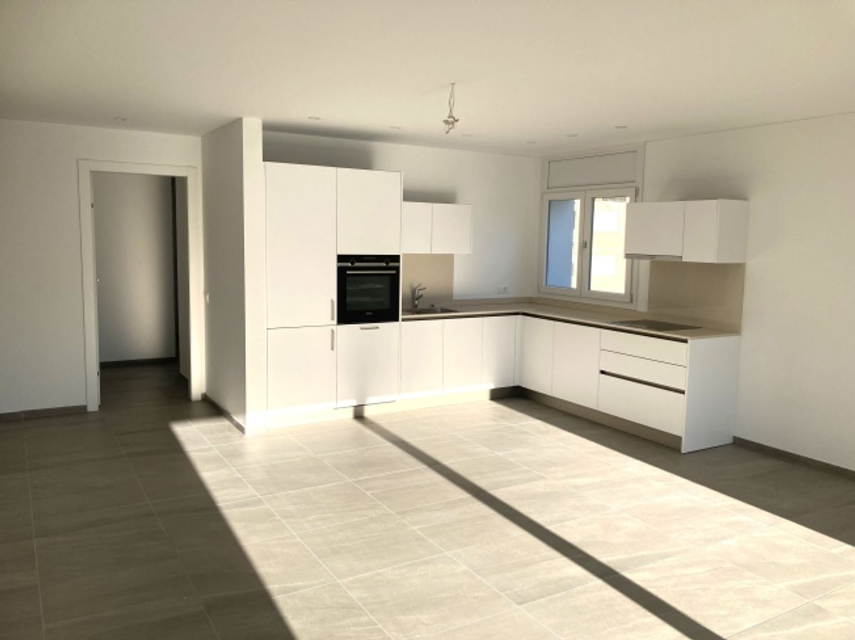 Appartamento 3.5 locali a Caslano, Canton TI - Moderno, raffinato e centrale - 1