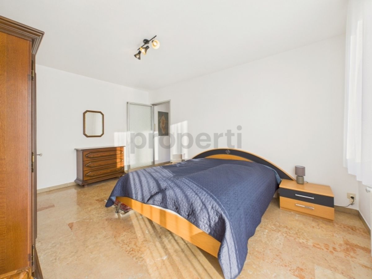 Spaziosa villa 5.5 locali con ampio giardino e vista aperta a Caslano - 5