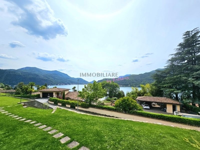 Wohnung in Villa Erdgeschoss mit Kamin, Sitzplatz und Seeblick - 11