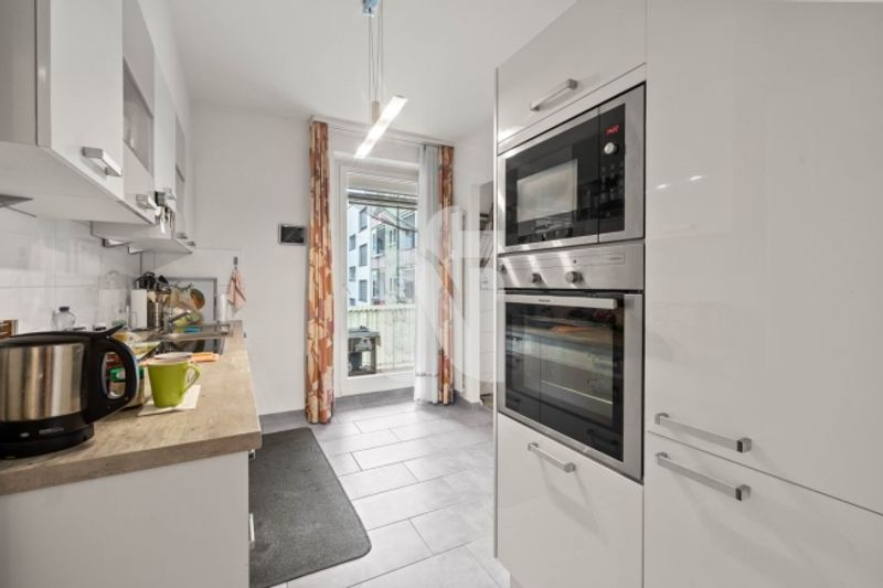 Grosszügiges Wohnen mit Balkon und Gemeinschaftsgarten in Basel - 5