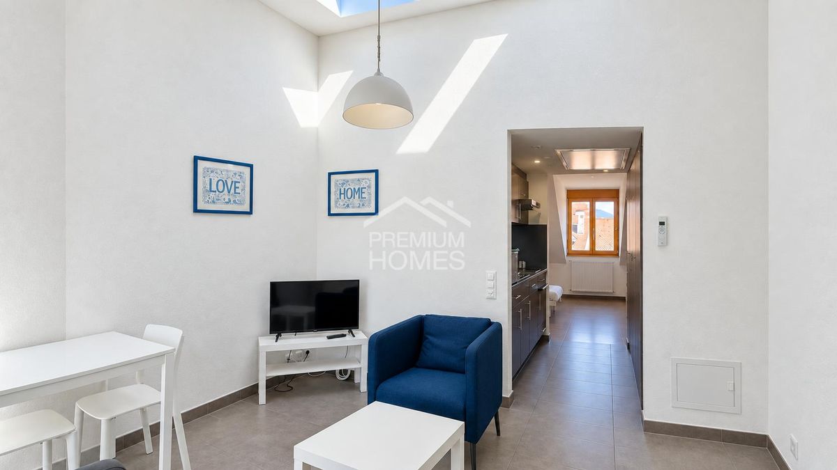 Immeuble de rendement avec 6 appartements et un commerce - 1