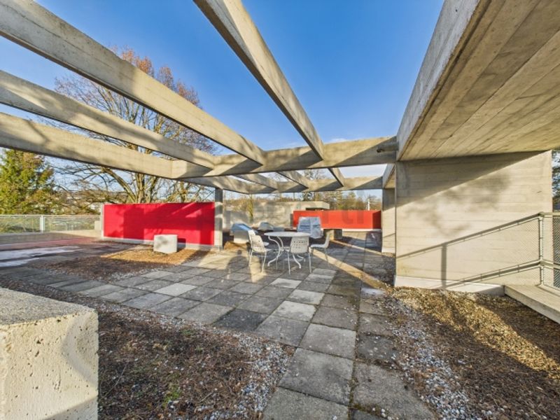 Wohnen in einer Ikone der Schweizer Architektur | Einzigartige Maisonettewohnung im denkmalgeschützten Atelier-5-Ensemble in Flamatt - 1