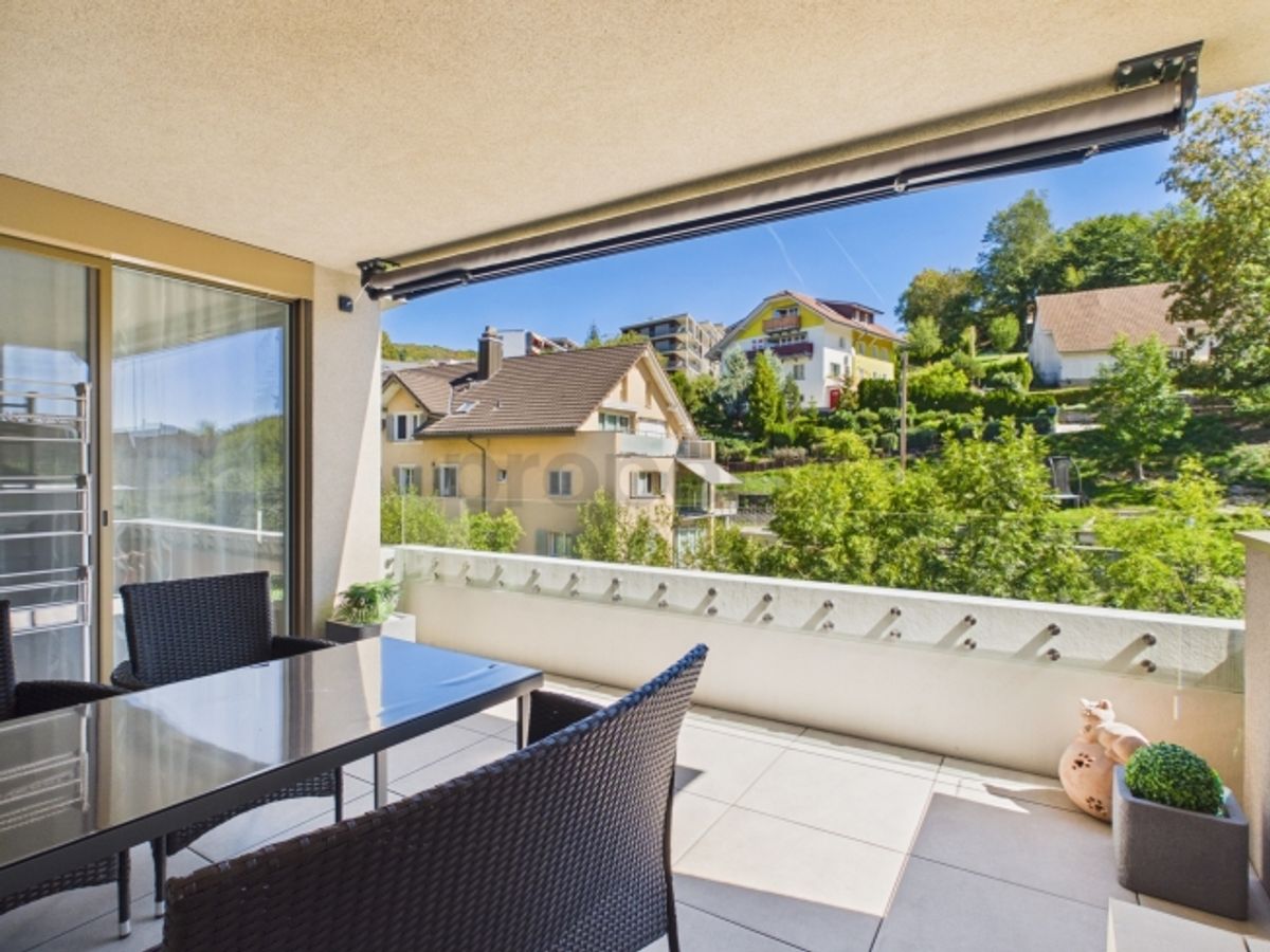Eigentumsstandard mit Panoramafenstern Grosszügige 74 m², Tiefgaragenplatz inklusive und sonniger Balkon - 8
