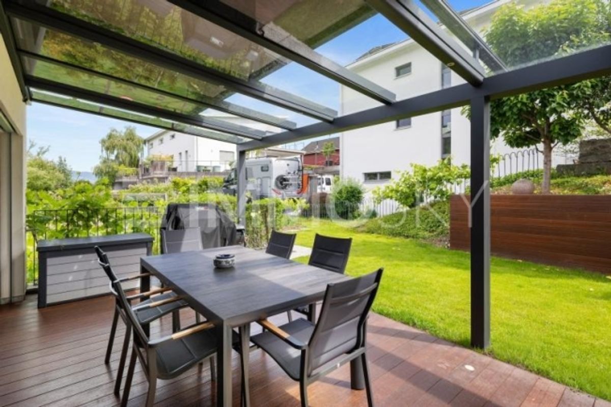 Modernes Raumwunder mit Garten - 1