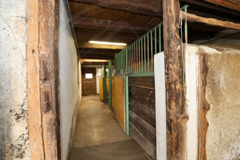 Zweifamilienhaus mit Stall und Landwirtschaftsland in Wettingen - 11