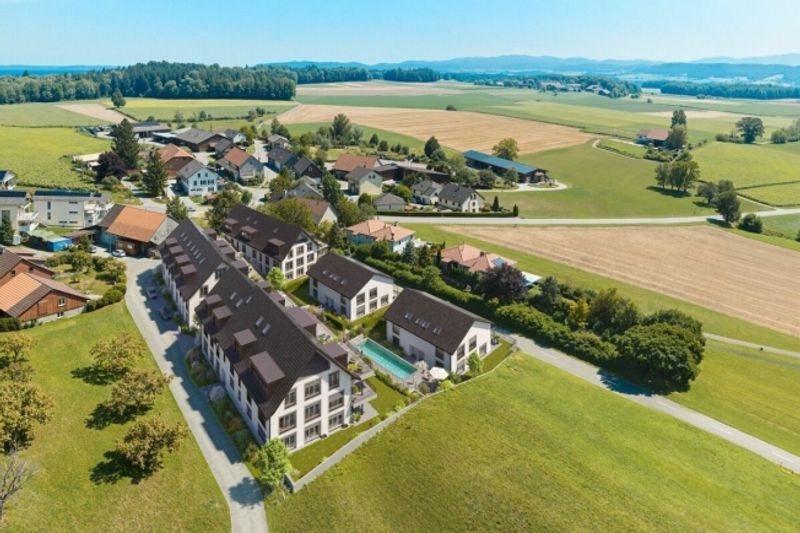 Neubau DORFRESORT - 3.5-Zi. Gartenwohnung mit Poolzugang - 3