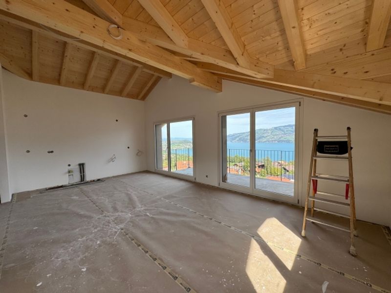 Herrliche Sicht auf den Thunersee, Grosszügige Terrasse (ca. 30 m²), Erstbezug im Neubau mit vier Einheiten - 1