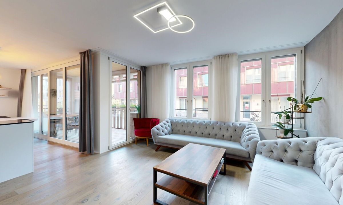 Moderne 5.5-Zimmer-Gartenwohnung an familienfreundlicher Lage - 1