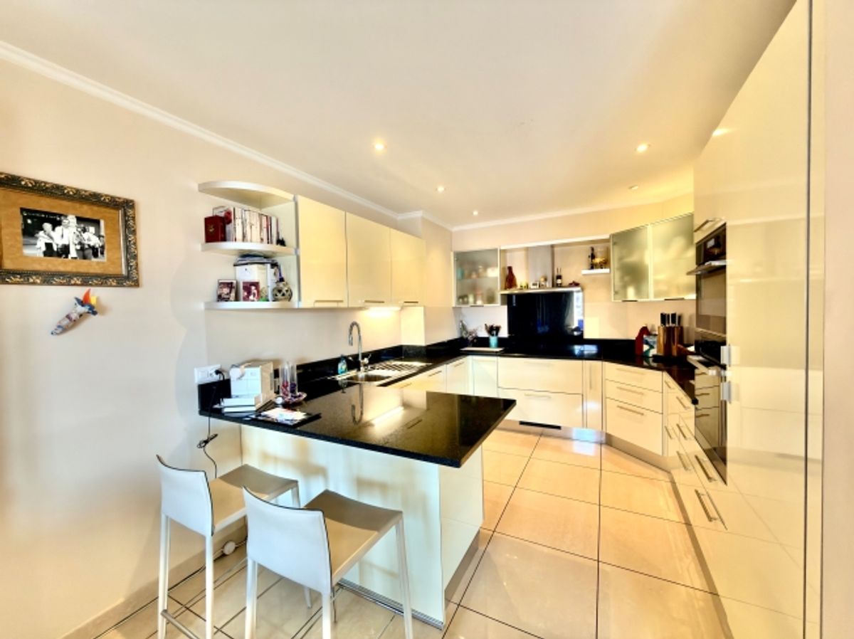 3787 Lugano EXKLUSIVE, GERÄUMIGE WOHNUNG MIT ÜBERDACHTER TERRASSE UND PRIVATEM GARTEN - 1