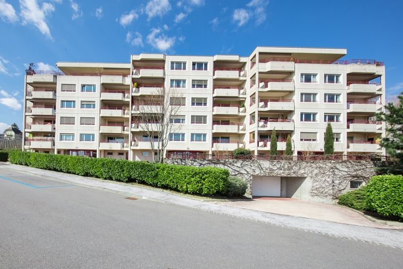 Place de parc intérieure à louer à la Rue des Troncs à Neuchâtel - 1