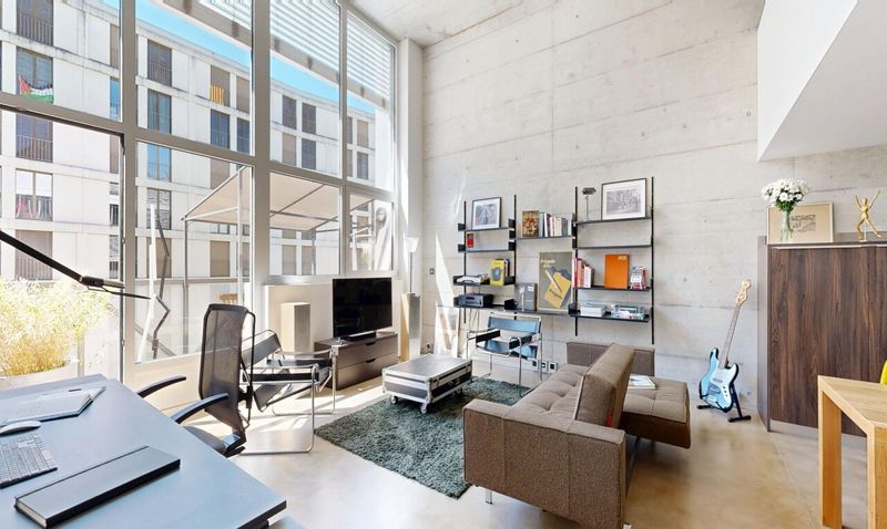 100 m² duplex loft in the former Suchard factory in Serrières - 8