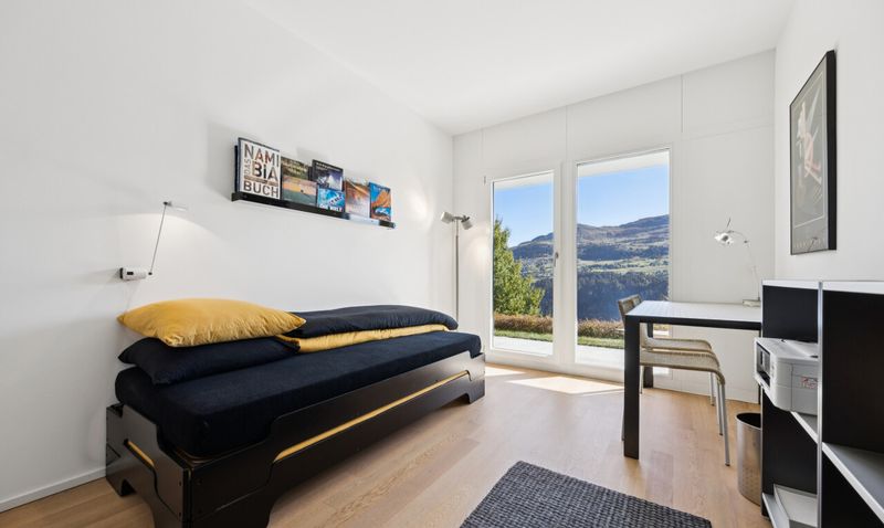 Zweitwohnsitz mit Panoramasicht: Architektenhaus in Andiast - 10
